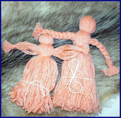 Thrum dolls from loom waste.